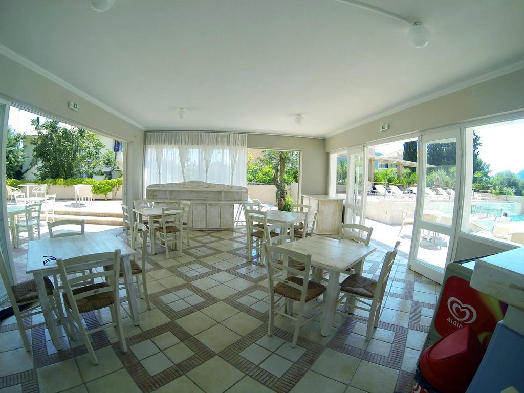 Happyland Hotel Apartments Нидри Экстерьер фото